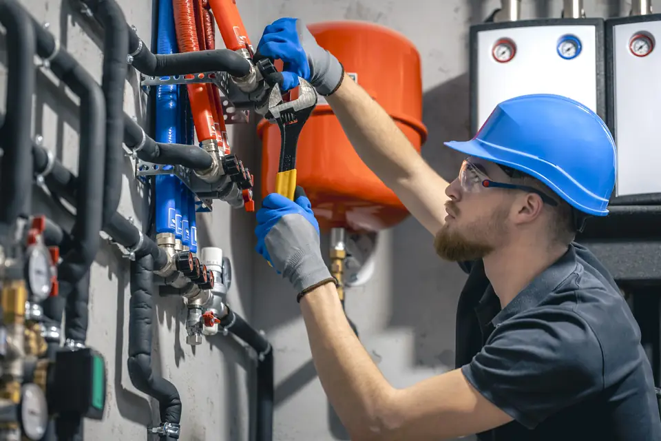 Technician working on electromechanical systems